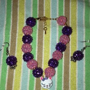 Pink and purple cat bracelet and earring set
